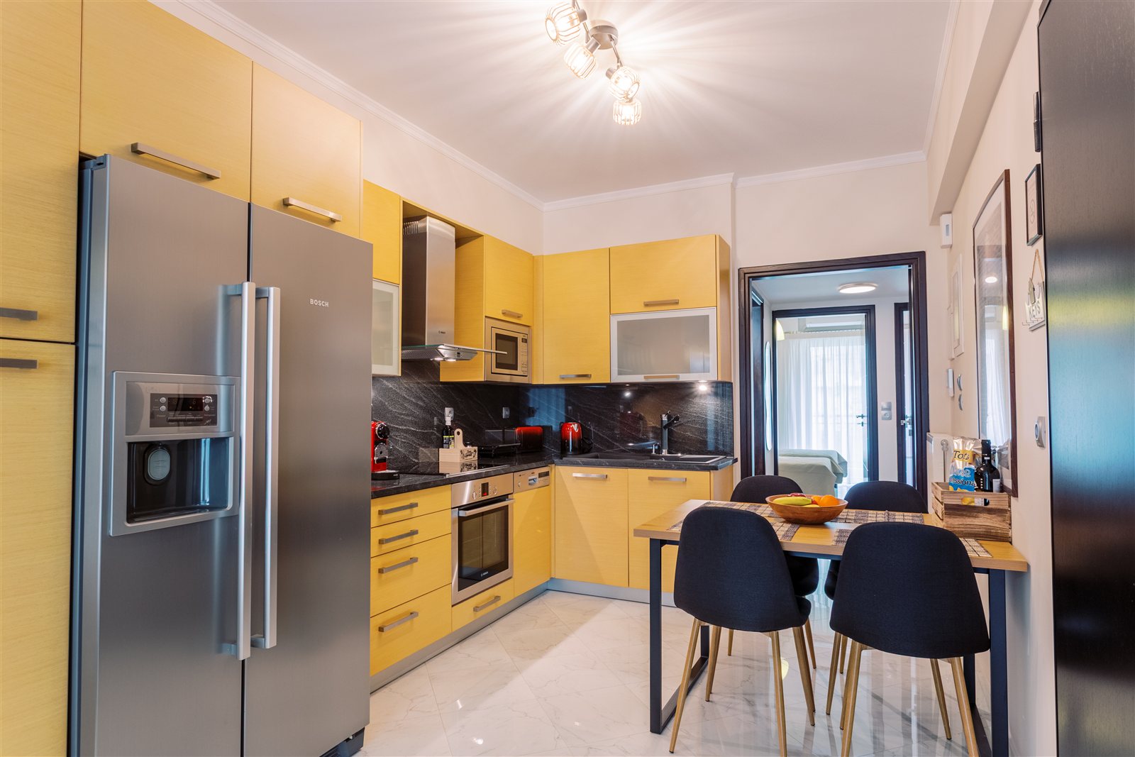 Kitchen and dining area at Gaia Apartment