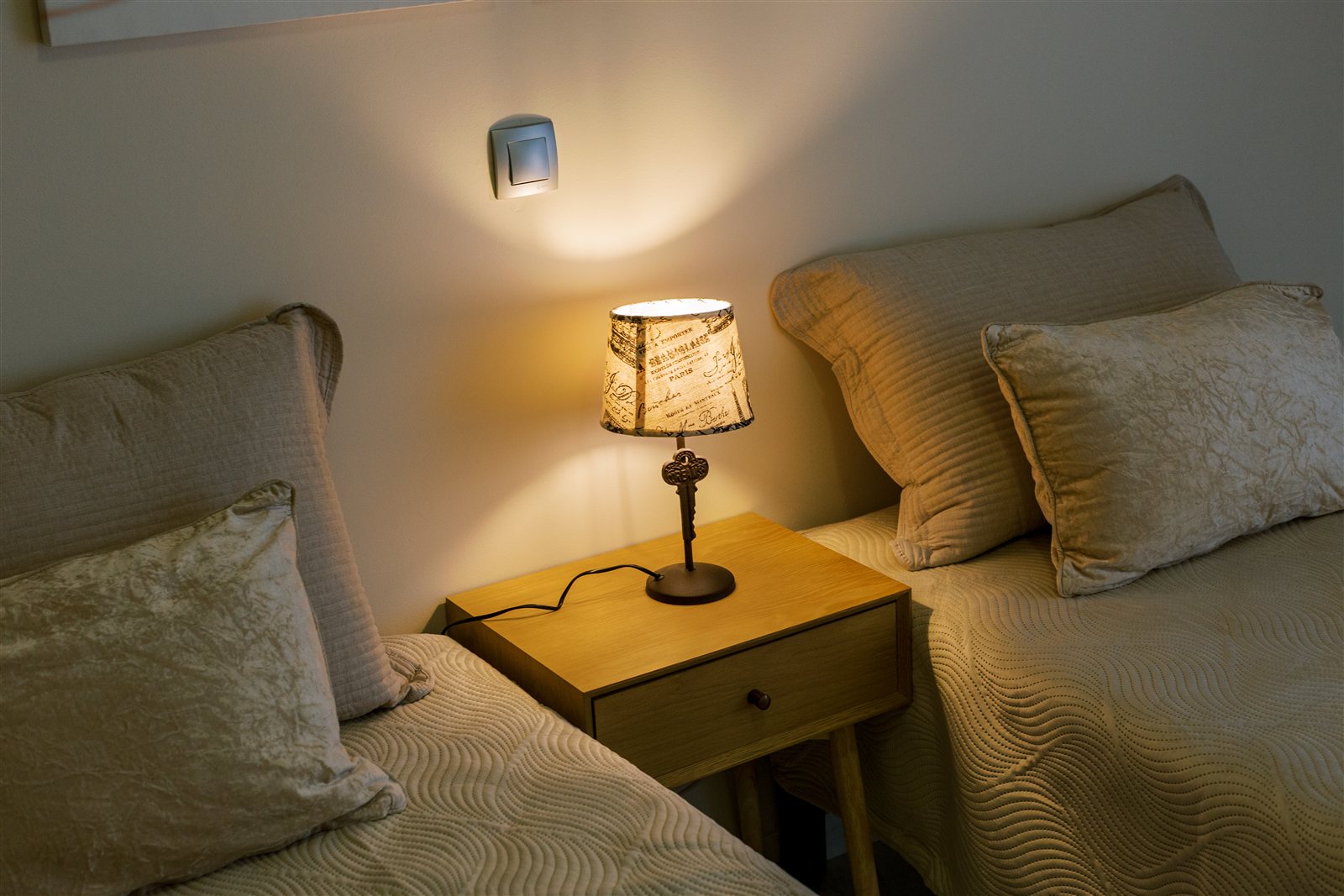 Bedside detail at Gaia Apartment