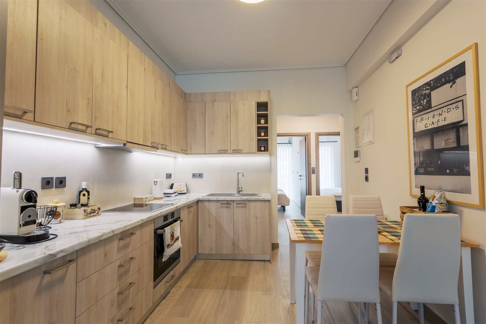 Kitchen and dining area at Helios Apartment
