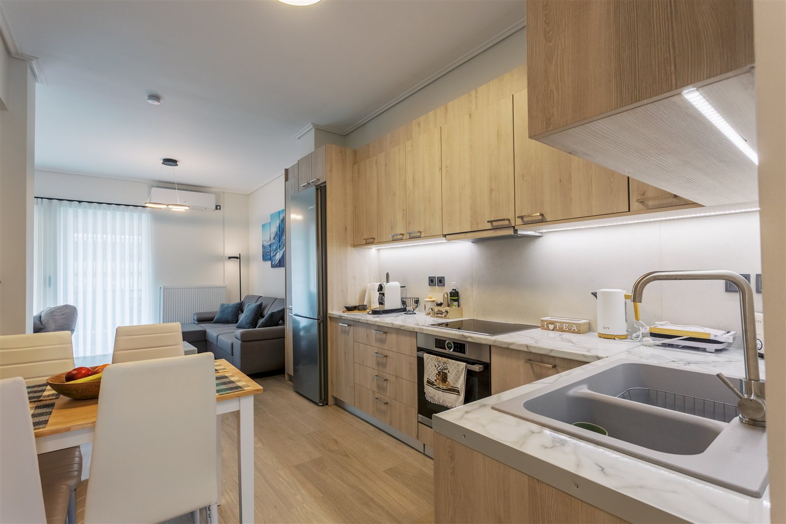 Kitchen and dining area at Helios Apartment