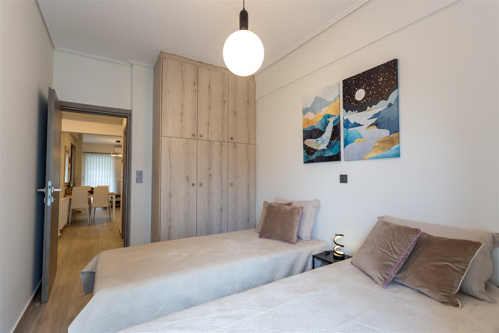 Twin bedroom at Helios Apartment