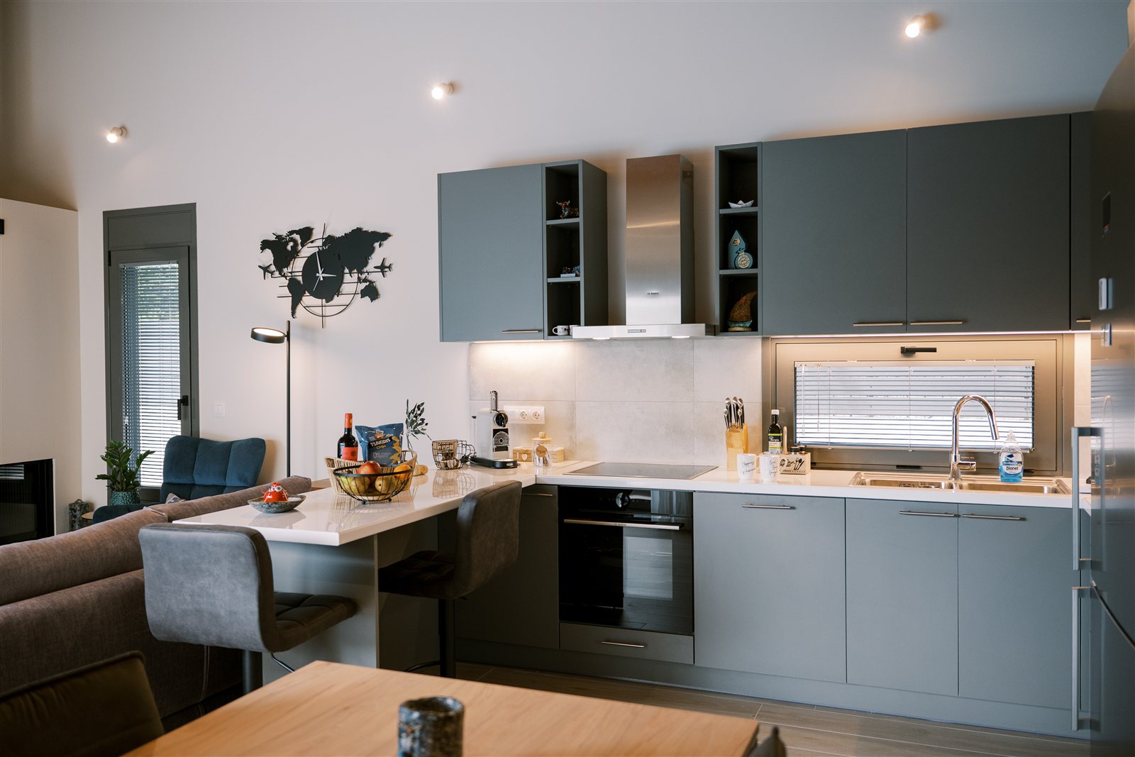 Kitchen and living area at Odysseas Seaside Escape
