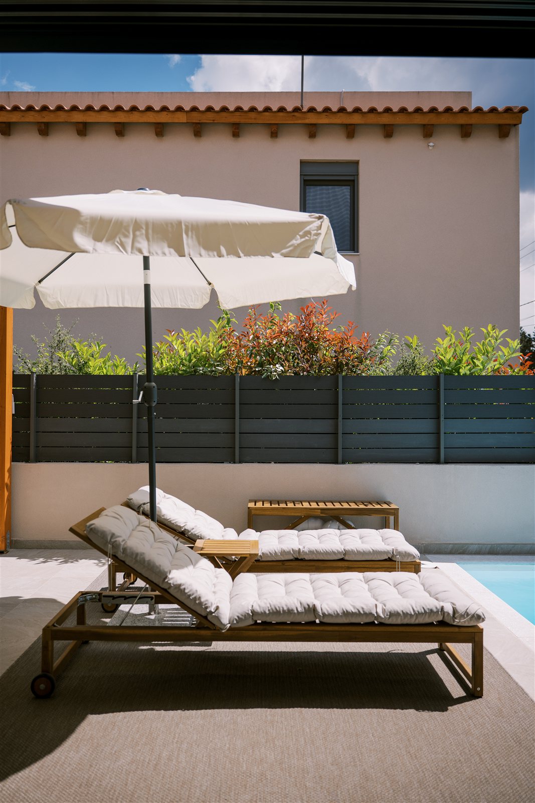 Sun loungers at Odysseas Seaside Escape