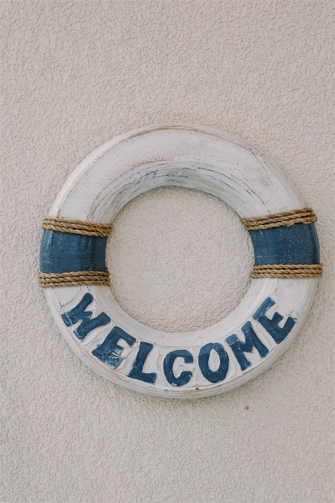 Welcome sign at Odysseas Seaside Escape